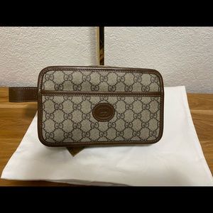 Gucci monogram clutch bag